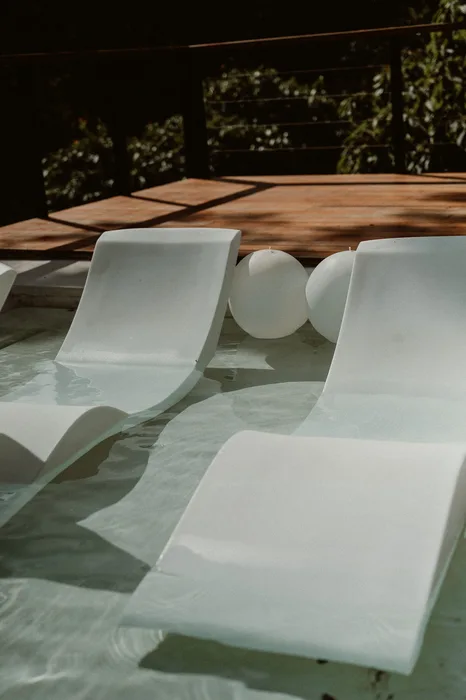 Pool loungers at Taru