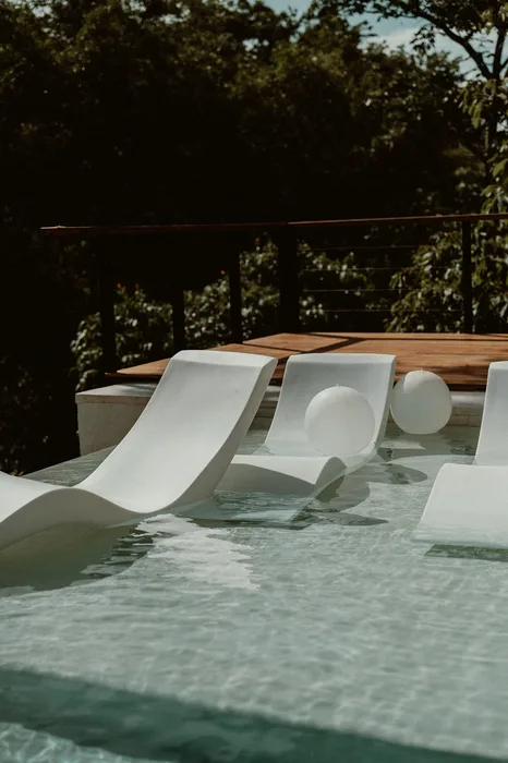 Pool loungers at Taru