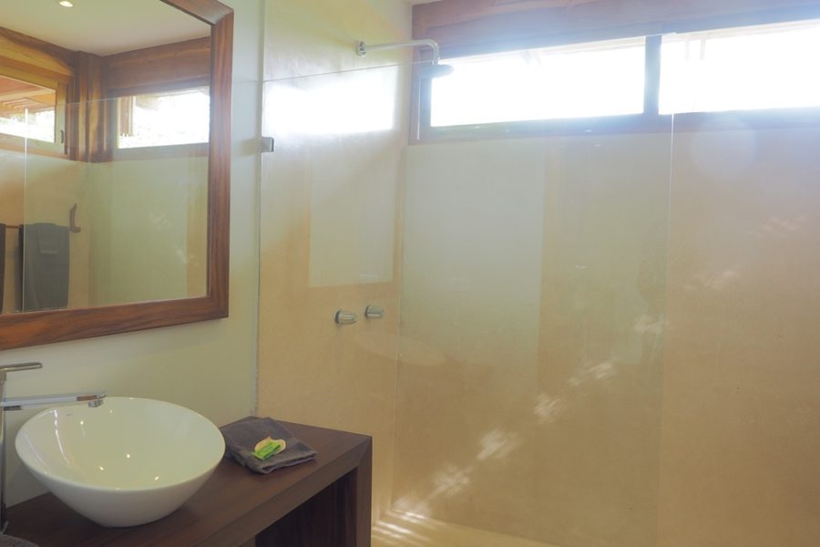 Garden Heights Studio bathroom with walk-in shower and vessel sink