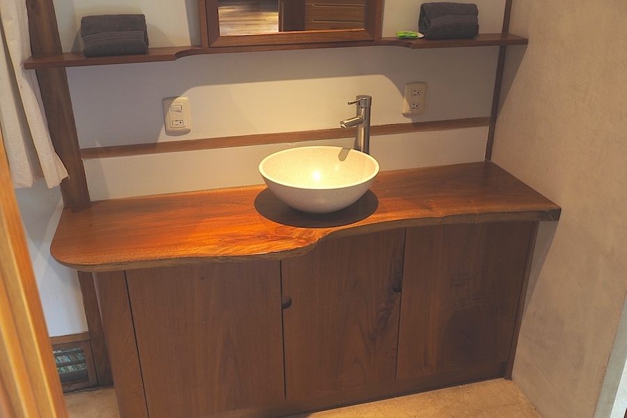 Bathroom vanity with vessel sink in the Jungle Canopy Bungalow