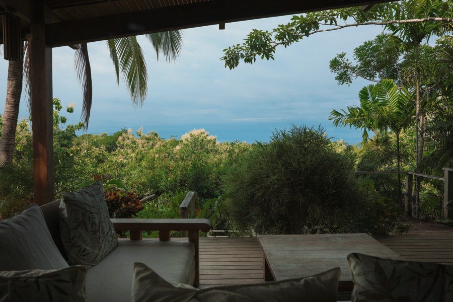 Ocean and rainforest view from the deck of the Sunrise Studio in Montezuma, Costa Rica